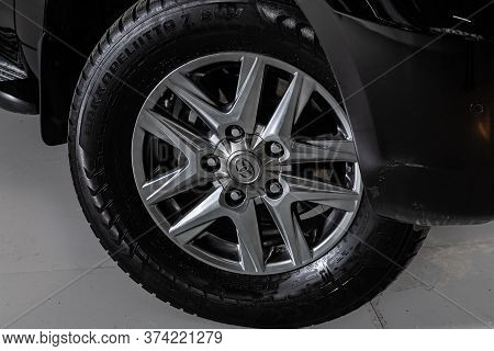 Novosibirsk/ Russia - April  02 2020: Toyota Land Cruiser 200  ,   Car Wheel With Alloy Wheel And Ne