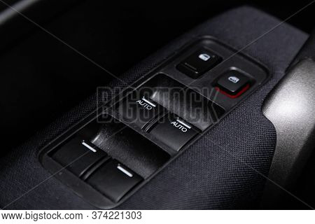 Novosibirsk/ Russia - April  11 2020: Honda Cr-v, Close-up Of The Side Door Buttons: Window Adjustme