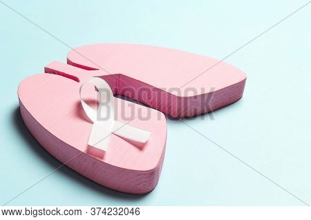 White Lung Cancer Awareness Ribbon And Lung Symbol On Blue Background. November Lung Cancer Awarenes