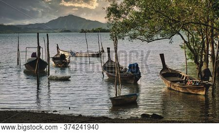 Beautiful Landscape In Phuket With Fishing Boats At Sunset