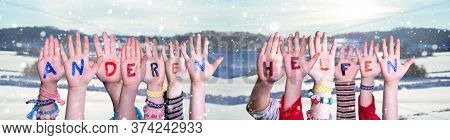 Kids Hands Holding Word Anderen Helfen Means Help Others, Winter Background