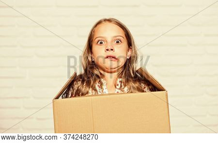 Make Moving Easier. Girl Small Child Carry Cardboard Box. Move Out Concept. Prepare For Moving. Rent