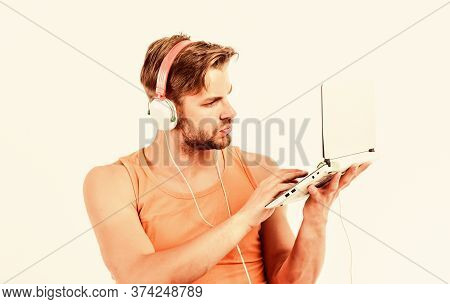 Web Blog. Relax Playlist. Sexy Muscular Man Listen Music From Playlist. Man Relax In Earphones Isola