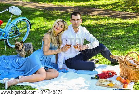 Inspiring Feelings. Cheers. Celebrate Anniversary. Attractive Couple Enjoying Romantic Sunset Picnic
