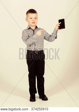 Confident Child Has Business Start Up. Modern Life. Small Boy With Mobile Phone. Little Boss. Ceo Di