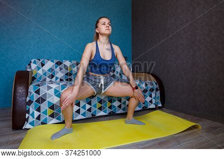 Beautiful Woman In Sportswear, Shorts And A Bra Standing In A Plie Pose, Exercises, Attractive Girl 