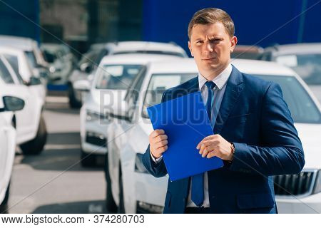 A Man Writes In A Tablet Next To The Car. An Accident On The Road, The Airbag Didnt Work.