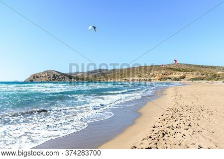 Prasonisi Beach With Kitesurfers Surfing In Waves (rhodes, Greece)