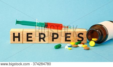 Herpes - Word From Wooden Blocks With Letters, Viral Diseases Herpes Viruses Concept