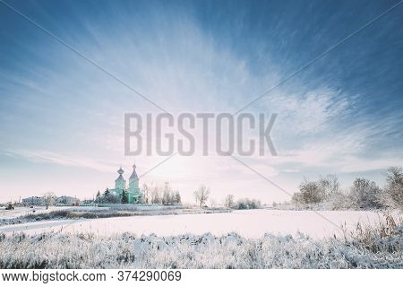 Village Krupets, Dobrush District, Gomel Region, Belarus. Old Wooden Orthodox Church Of The Holy Tri