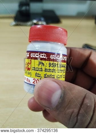 Bangalore, Karnataka/india-jan 03 2019: Plastic Container Of Lime Chats Or Dry Pickle. Home Made Rem