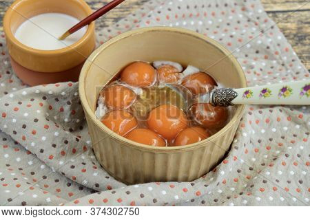 Bubur Biji Salak, Indonesian Dessert Porridge Of Sweet Potato Balls With Coconut Milk. A Popular Foo