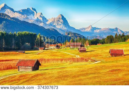 Fantastic View Of Alpine Valley With Wooden Huts  Near Wagenbruchsee (geroldsee) Lake With Zugspitze