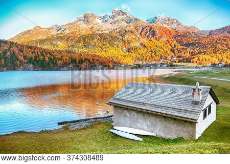 Awesome Autumn Panorama Of Silvaplana Lake And Surlej Village. Location: Silvaplana, Maloya District