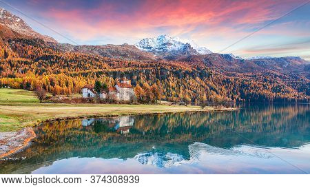 Astonishing Autumn View Of Crap Da Sass Castle On Silvaplana Lake At Sunset. Location: Silvaplana, M
