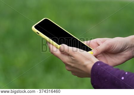 Phone For Keeping In Touch. Mobile Phone In Female Hands. Cell Phone With Touchscreen Technology. Ph