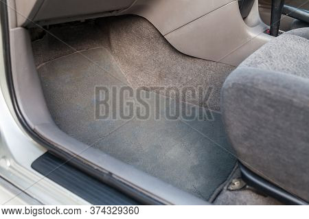 Car Mat In The Front Passenger Seat Made Of Beige Fabric Material In The Service After Dry Cleaning 