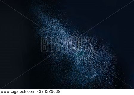Water Spray Against Black Background. Aerosol Sprays Small Drops Of Water. Slow Motion In 120 Fps. S