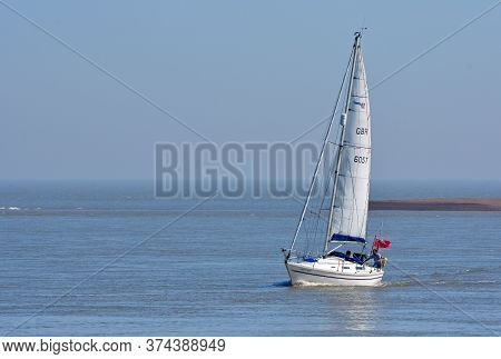 Felixstowe, Suffolk, England - June 26, 2020: Yacht Under Sail At The Estuary Of The River Deben At 