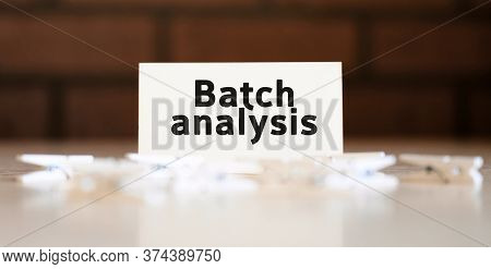 Batch Analysis Text Of Business Concept On White List And With Clothespins