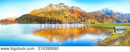 Awesome Autumn Panorama Of Silvaplana Lake And Surlej Village. Location: Silvaplana, Maloya District