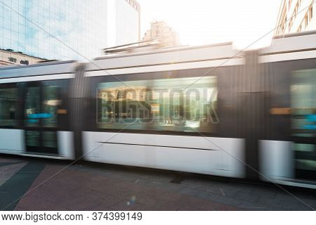 Public Transport Tram Motion Blur In Rio De Janeiro City Downtown By Sunset