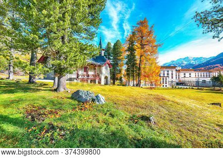 Awesome Autumn Scene In Swiss Alps And Maloja Palace. Colorful Autumn Scene Of Swiss Alps. Location: