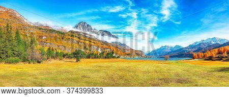 Charming Autumn Scene In Swiss Alps And Views Of Sils Lake (silsersee). Colorful Autumn Scene Of Swi