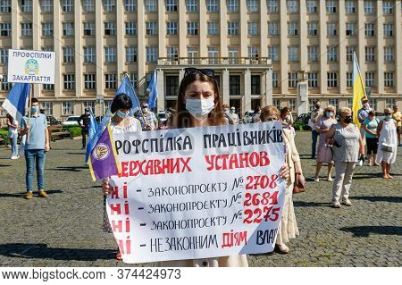 Uzhgorod, Western Ukraine - June 30, 2020: Union Workers In Protective Masks Are Protesting Against 