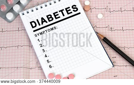 Notebook Page With Text Diabetes On A Table With A Pills And Pencil, Medical Concept, Top View