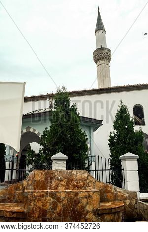 Minaret And Fountain Of The Murat Pasha Mosque In The Old Bazaar Of Skopje, Capital City Of North Ma