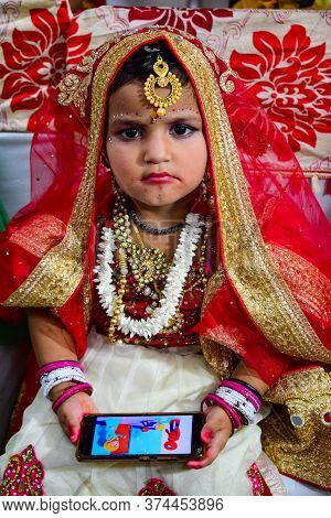 Delhi, India - September 9, 2019 : Cute Indian Kids Dressed Up As Little Lord Krishna Radha On The O