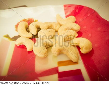 A Closeup Shot Of Cashew Nuts Made Ready For Making Semiya Payasam In A Plate.full Cashew Nuts Looks