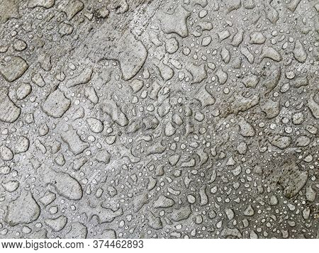 Frozen Raindrops On A Concrete Plane, For The Background, Gray