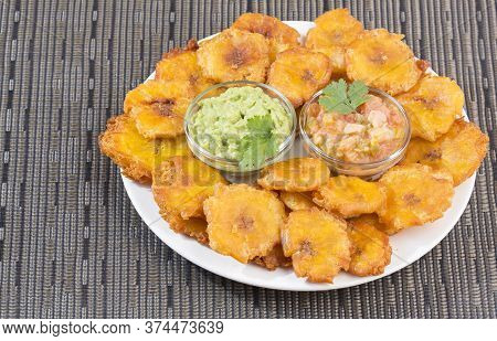 Patacón Fried Flattened Pieces Of Green Plantain (tostón, Tachino)