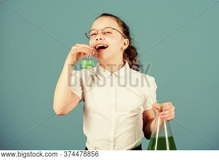 Science Research In Lab. Small School Girl. Small Smart Girl With Testing Flask. Child Study Bilogy 
