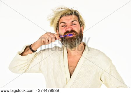 Carefree Guy Hold Tooth Brush. Health And Hygiene. Handsome Man Brush Teeth In Morning. Relaxed Man 