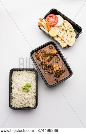 Mutton Masala Curry In Plastic Container For Home Delivery