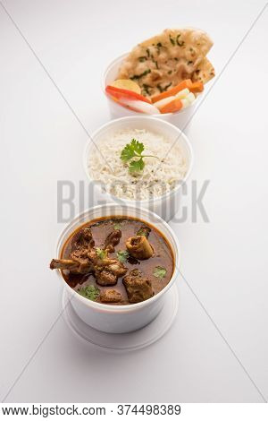 Mutton Masala Curry In Plastic Container For Home Delivery