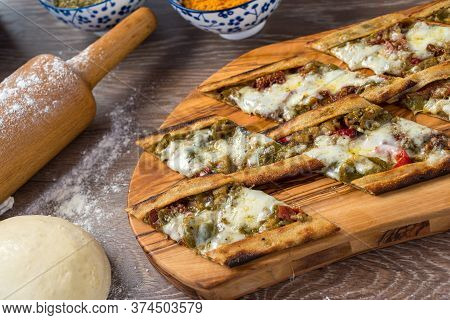 Traditional Turkish Baked Dish Pide. Turkish Pizza Pide, Middle Eastern Appetizers. Turkish Cuisine.