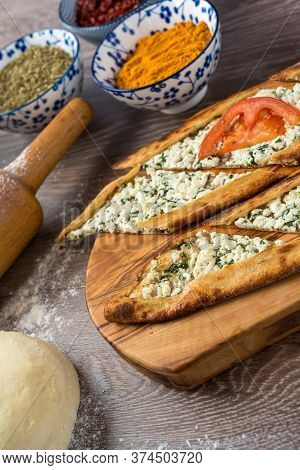 Traditional Turkish Baked Dish Pide. Turkish Pizza Pide, Middle Eastern Appetizers. Turkish Cuisine.