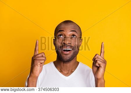 Close Up Photo Of Astonished Crazy Afro American Guy Indicate Incredible Ads Sales Discount Point In