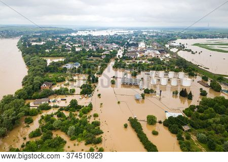 Aerial View Of Flooded Houses With Dirty Water Of Dnister River In Halych Town, Western Ukraine.