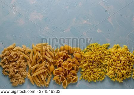 Assorted Italian Pasta: Penne Rigate, Conchiglie, Cavatappu, Fusilli, Galetti Horizontal Orientation