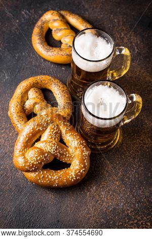 Beer And Pretzels. Oktoberfest Concept. Bavarian Festive Fod