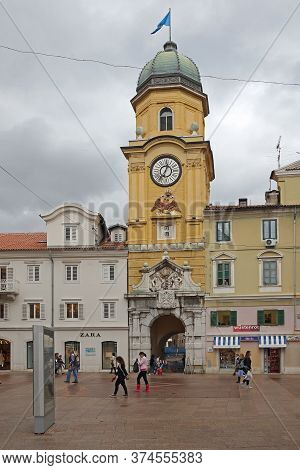 Rijeka, Croatia - October 17, 2014: Clock Tower And City Gate Landmark Tower At Korzo Street In Down