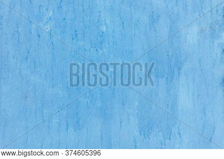 Blue Metal Door With Smudges Of Paint