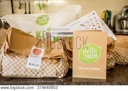 Sydney, Australia 2020-05-09 Hello Fresh Meal Kits Packed In Paper Bags On A Kitchen Countertop.