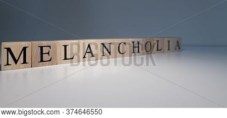 Text Of Melancholia From Wooden Cubes. Psychological Terms And Health Problems.