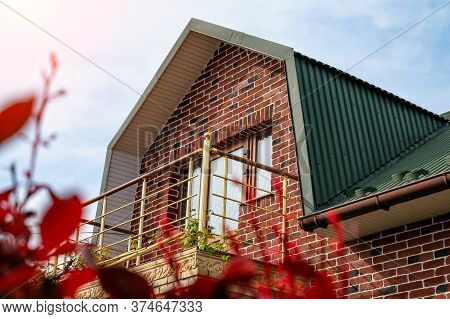 . Gutter System For A Metal Roof. Holder Gutter Drainage System On The Roof.